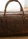 leatheroma-vintage-brown-leather-duffel-bag-close-up.jpg.webp